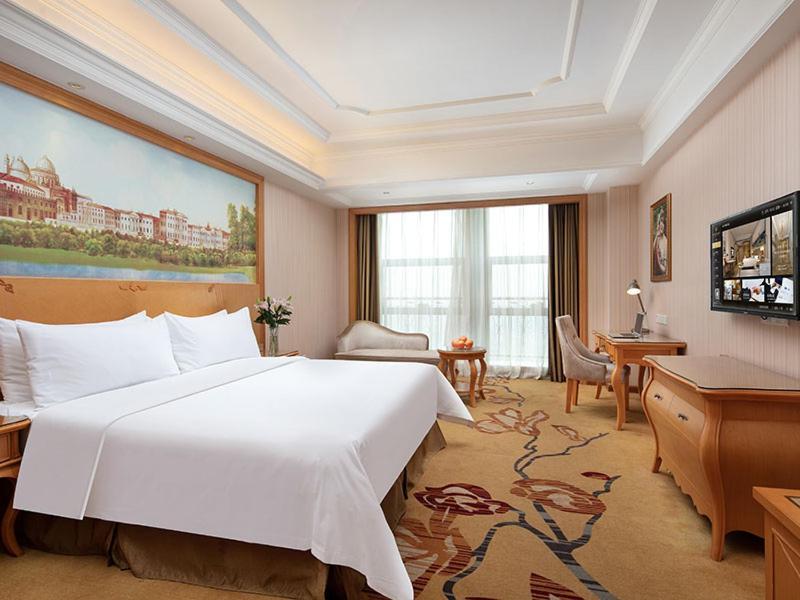 Vienna International Hotel Jiujiang Shili Street Exterior photo